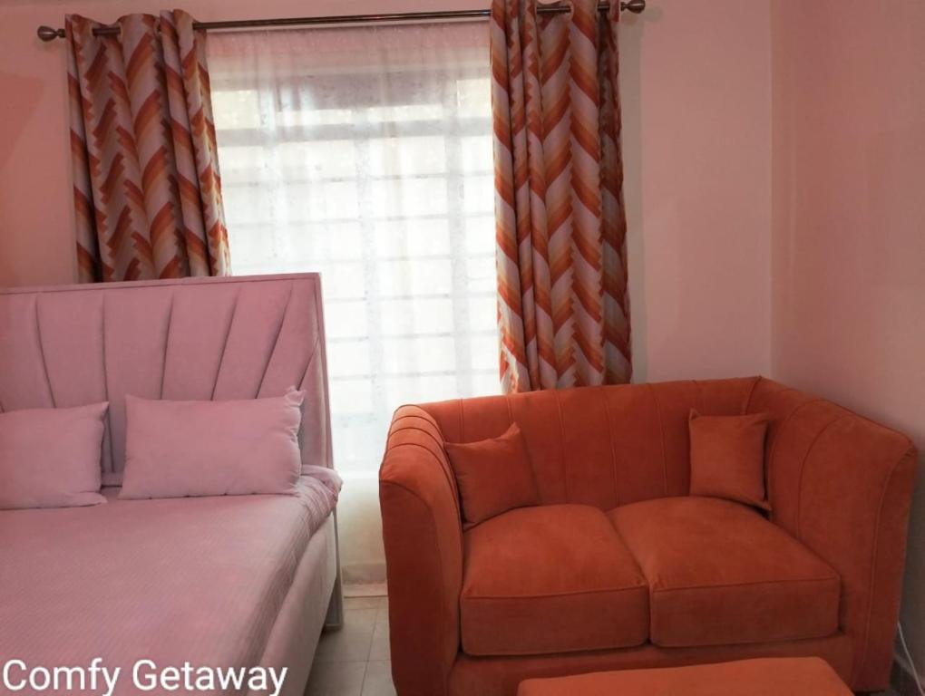 Comfy Getaway STUDIO apartment near JKIA & SGR with KING BED, WIFI, NETFLIX and SECURE PARKING